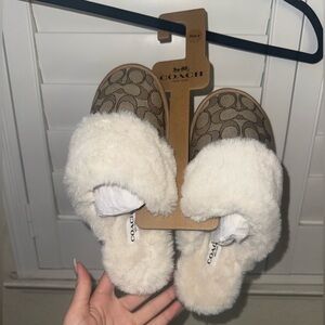 Woman’s authentic Coach house slippers (size 8 but fits more like 6.5)